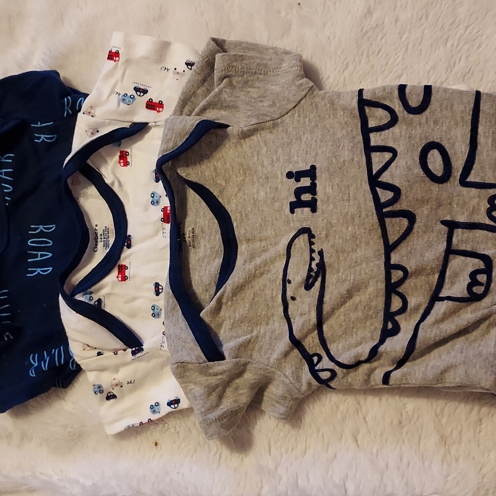 3 printed Gerber onsies